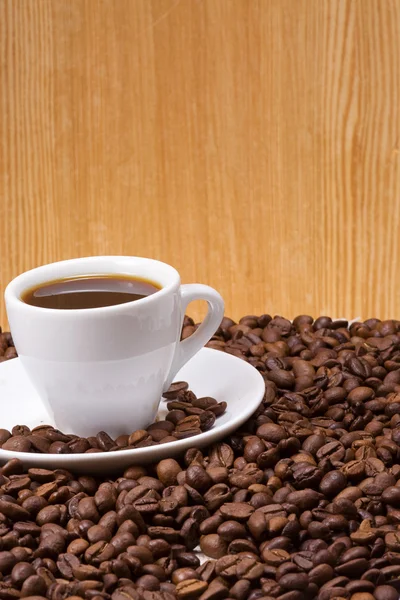 Kaffee auf Holzwand — Stockfoto
