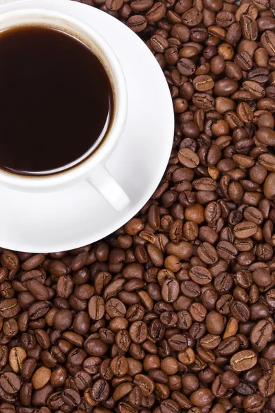 Kopp kaffe och bönor — Stockfoto