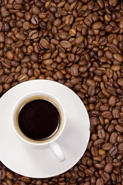 Copo em grãos de café — Fotografia de Stock