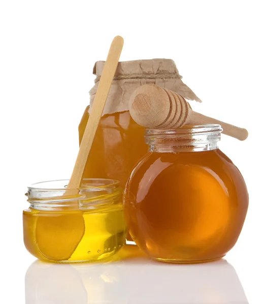 Pot full of honey and stick isolated on white — Stock Photo, Image