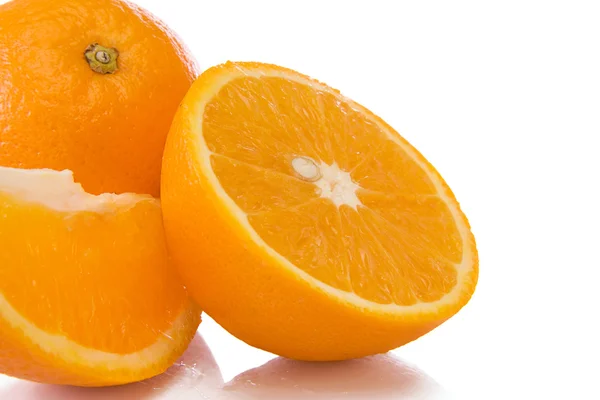 Sliced oranges isolated on white — Stock Photo, Image