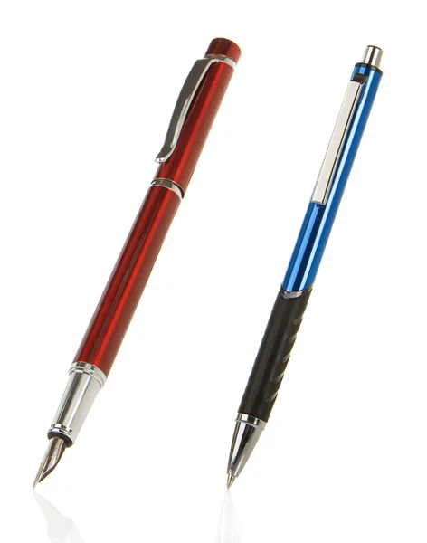 Röda och blå silver pennor på vit — Stockfoto