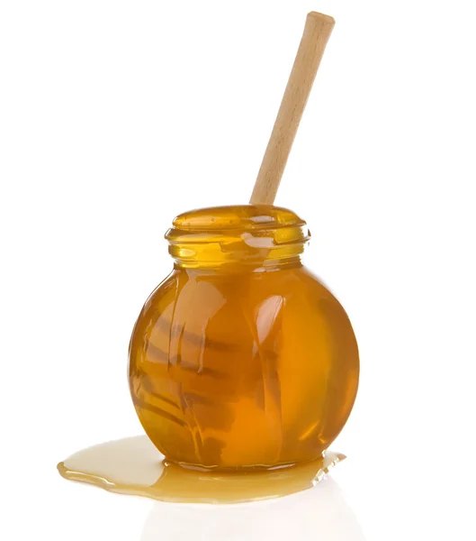 Olla de vidrio llena de miel aislada —  Fotos de Stock