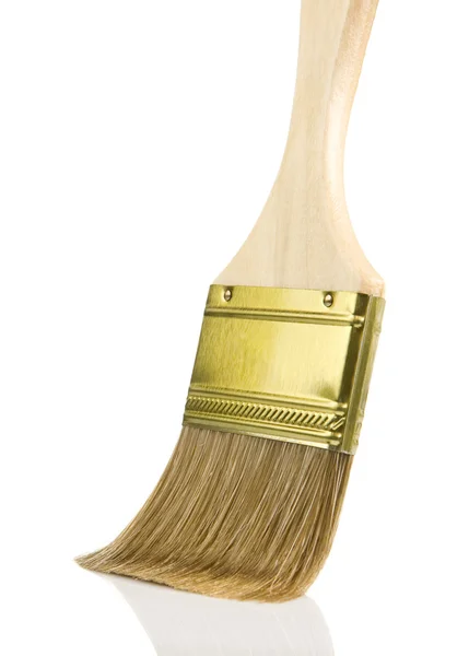 Wooden gold paintbrush isolated on white — Stock Photo, Image