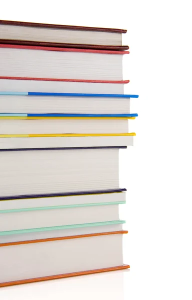 Pile of new books isolated on white — Stock Photo, Image