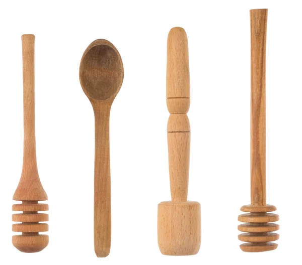 Cucchiaio di legno e utensili isolati su bianco — Foto Stock