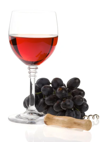 Вино из стекла и винограда — стоковое фото