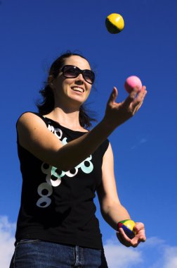 Woman Juggling Balls clipart