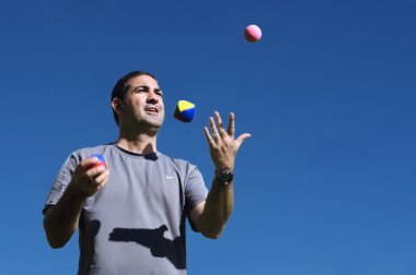 Man Juggling Balls clipart