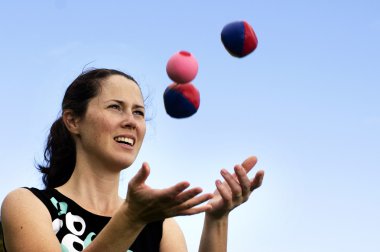 Woman Juggling Balls clipart