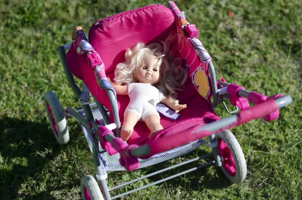 Doll in carriage — Stock Photo, Image