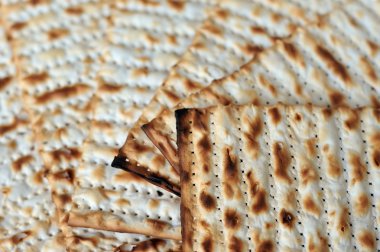 Traditional Jewish Matzo sheet on a Passover Seder table clipart