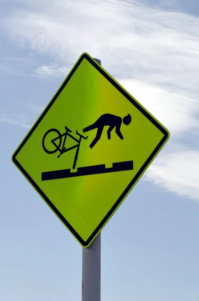 Let op fiets gevaar teken — Stockfoto