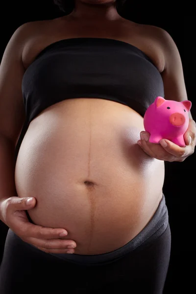 Banco de gravidez e porquinho — Fotografia de Stock