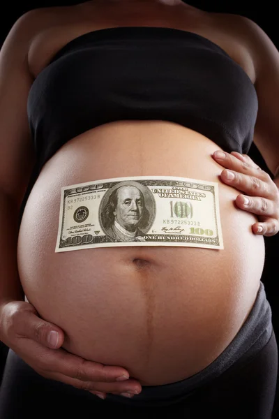 stock image Pregnancy and dollar