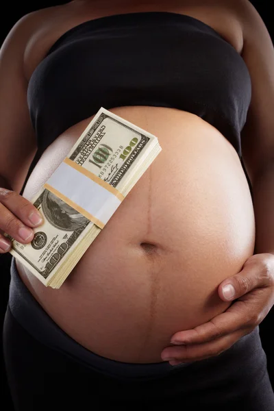 stock image Pregnancy and dollar