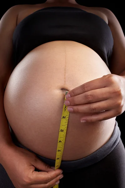Ciąży i taśma miernicza — Zdjęcie stockowe