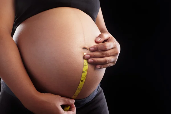 Terhesség és mérőszalaggal — Stock Fotó