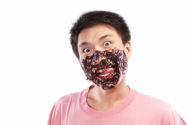 Asiatische Mann und Schokoladenaufstrich — Stockfoto