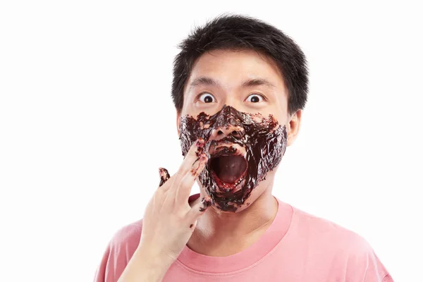 Asiatische Mann und Schokoladenaufstrich — Stockfoto