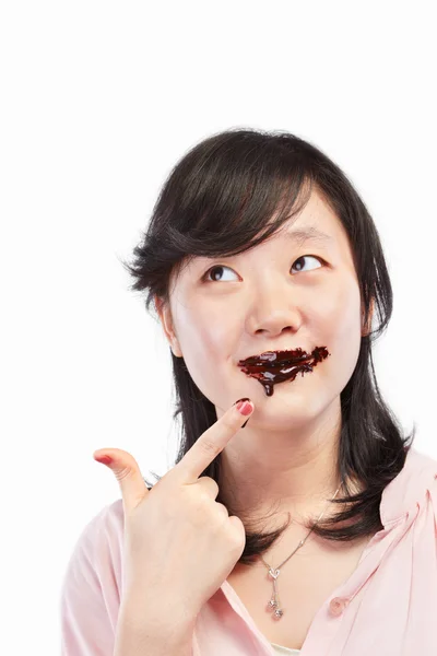 Азиатская леди и шоколад — стоковое фото