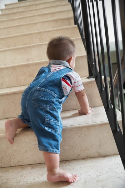 Baby crawling alon on stairs — Stock Photo, Image