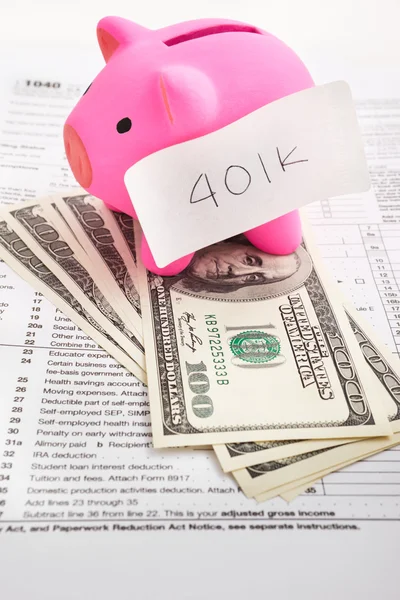 Piggy bank and tax forms — Stock Photo, Image