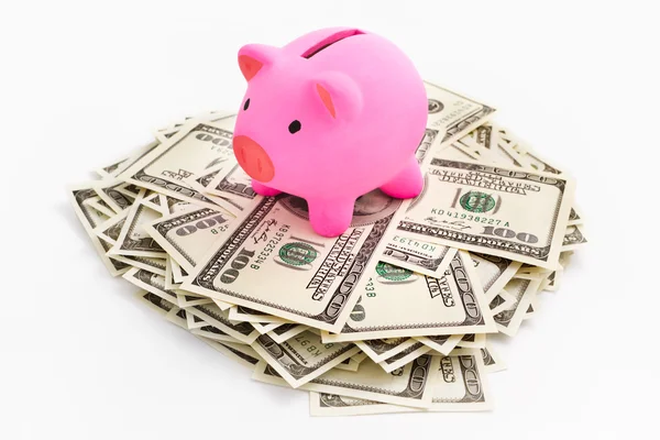 Piggy bank van dollar stack — Stockfoto