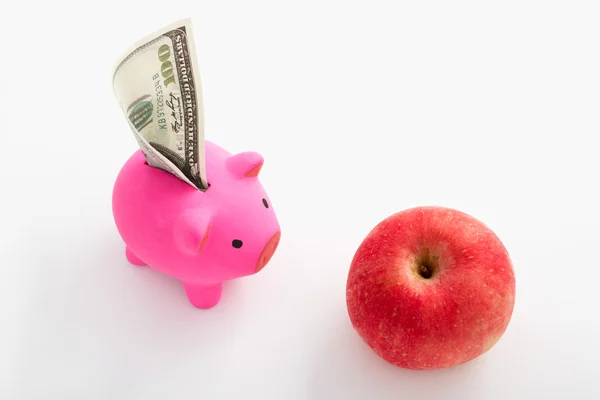 stock image Piggy bank , dollar and apple