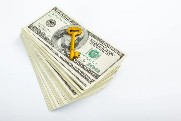 Golden key and dollar — Stock Photo, Image