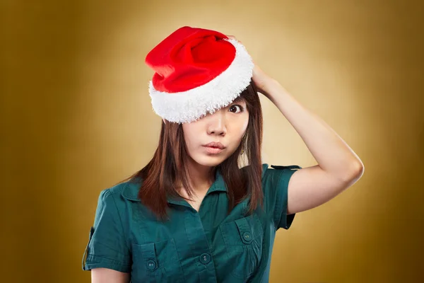 Dziewczyna w kapeluszu Świętego Mikołaja — Zdjęcie stockowe