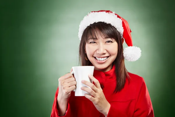 Ragazza di Natale con tazza di bevanda — Foto Stock
