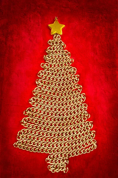 Golden chain Christmas tree on red — Stock Photo, Image