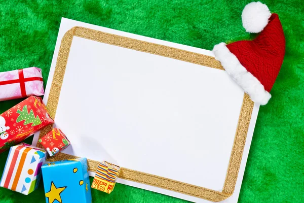 Papel en blanco y regalos de Navidad — Foto de Stock
