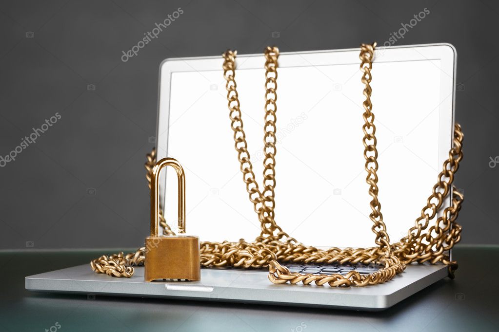 Open laptop with chain and lock