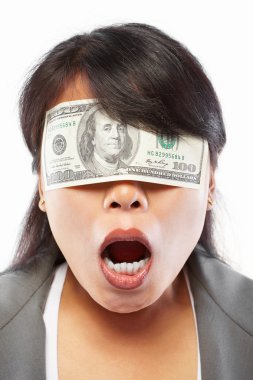 Businesswoman being blinded with money clipart