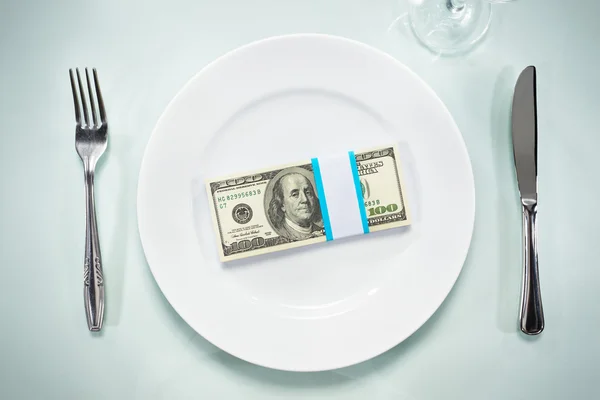 Dólar no prato — Fotografia de Stock