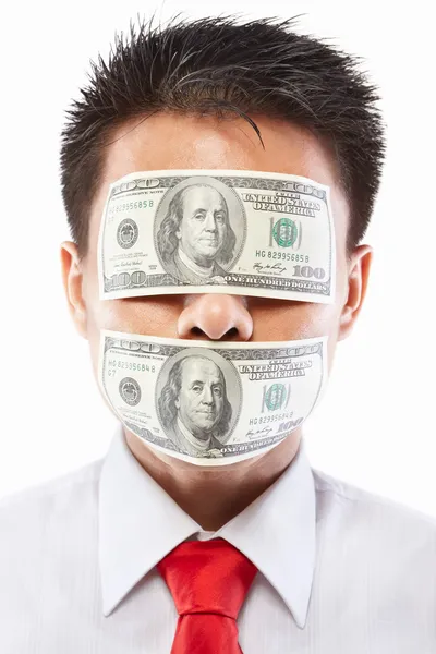 Bribe concept, eyes and mouth sealed with dollar bill — Stock Photo, Image