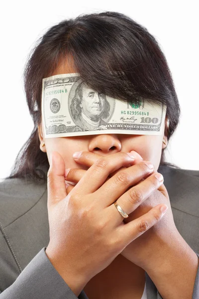 Businesswoman being blinded with money — Stock Photo, Image