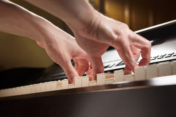 Playing piano from low angle — Stock Photo, Image