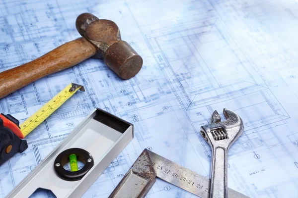 Working tool and blueprint — Stock Photo, Image