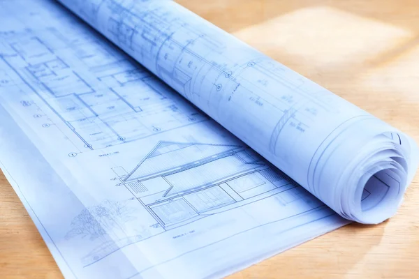 Blueprint na drewniane biurko — Zdjęcie stockowe