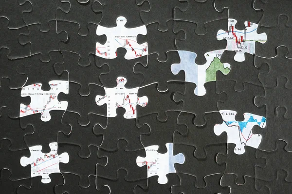 Jigzaw puzzle e grafico economico — Foto Stock