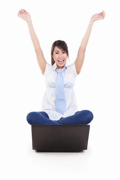 Excited young female with laptop — Stock Photo, Image