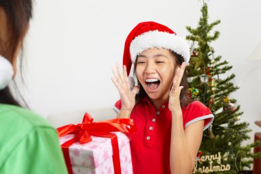 Girl got Christmas ppresent clipart