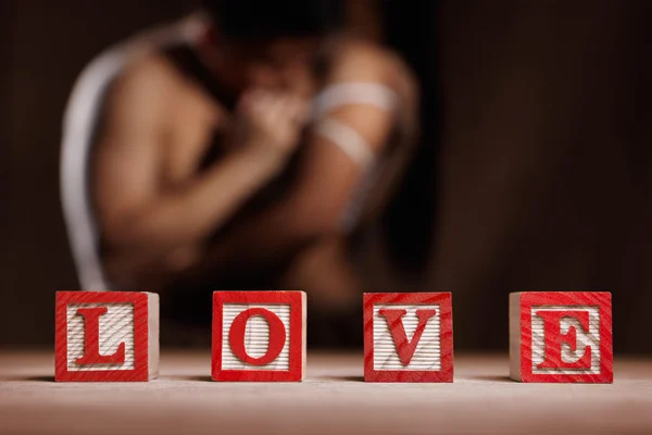 stock image Word LOVE and couple