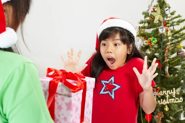 Girl got Christmas ppresent — Stock Photo, Image
