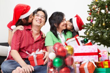 Family's love in Christmas season clipart