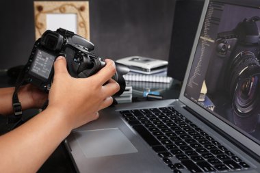 Photographer preparing camera clipart