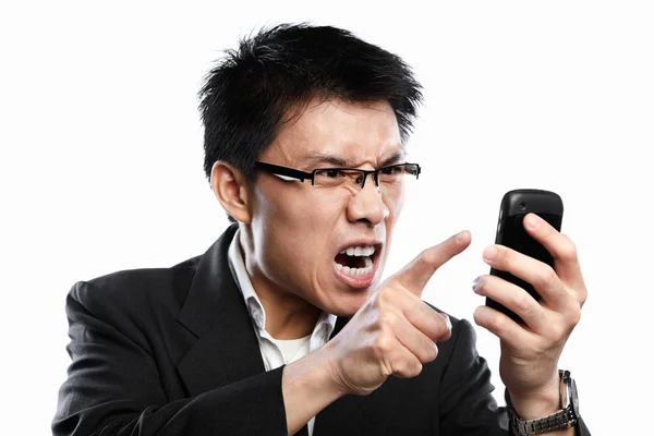 Video çağrısı kullanırken işadamı kızgın ifade — Stok fotoğraf